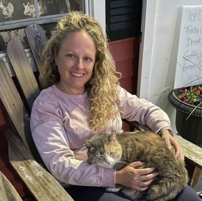 Kim Wall with Ellie the cat